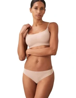 Calvin Klein Invisibles Thong in Beige