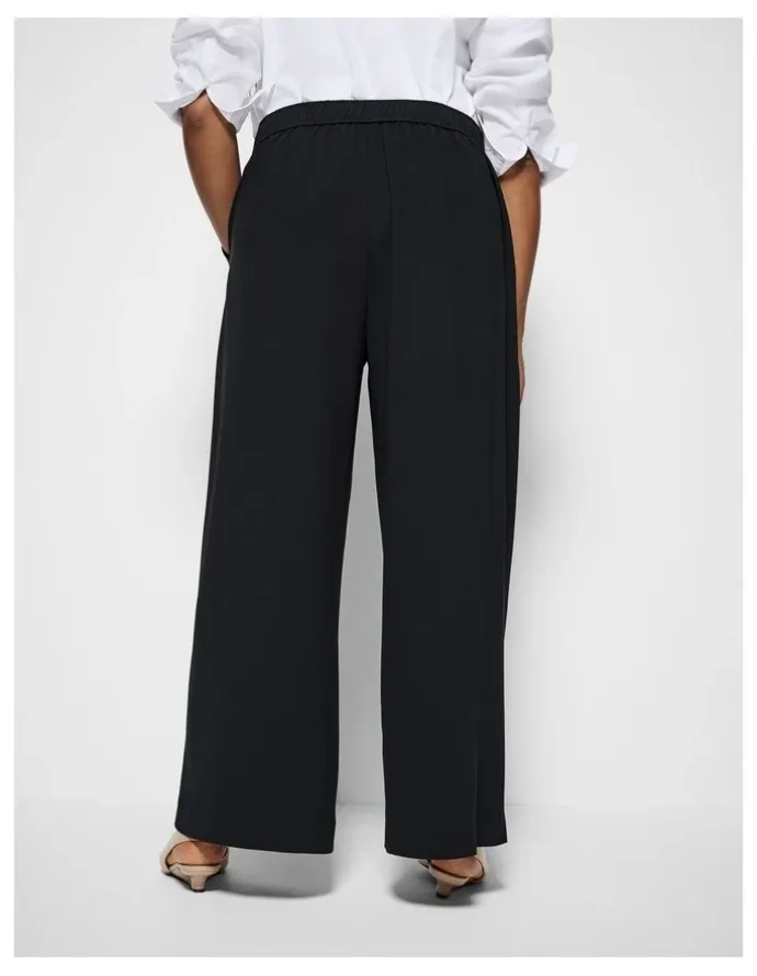 Commonry The Draped Leg Crepe Trouser in Black